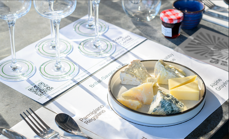 Cheese board and sake glasses at the Sake and Cheese Pairing class