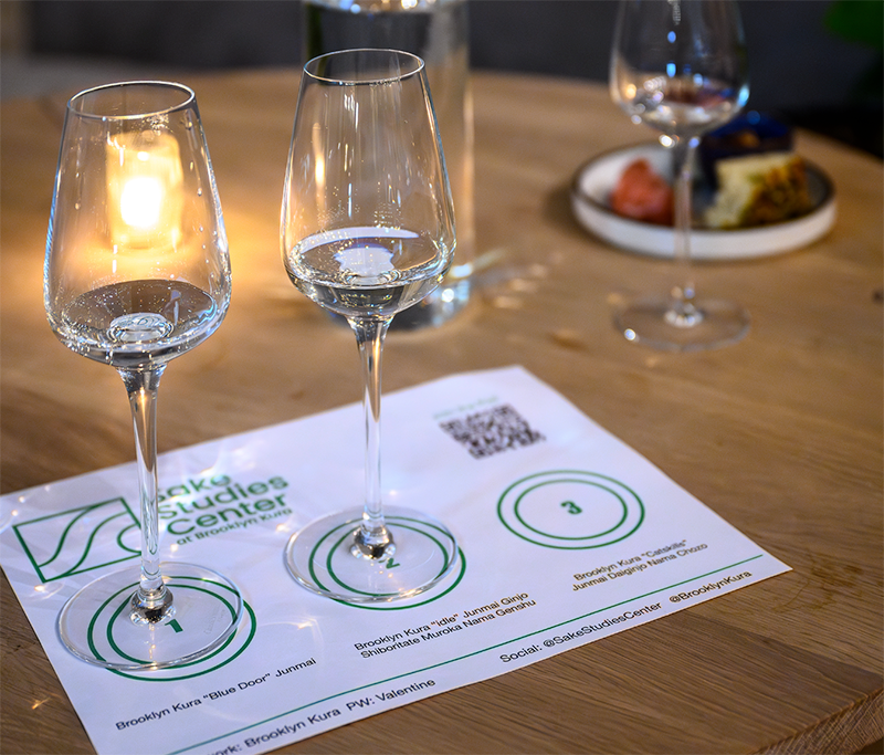 A guided sake tasting flight on the Sake Studies Center tasting mat