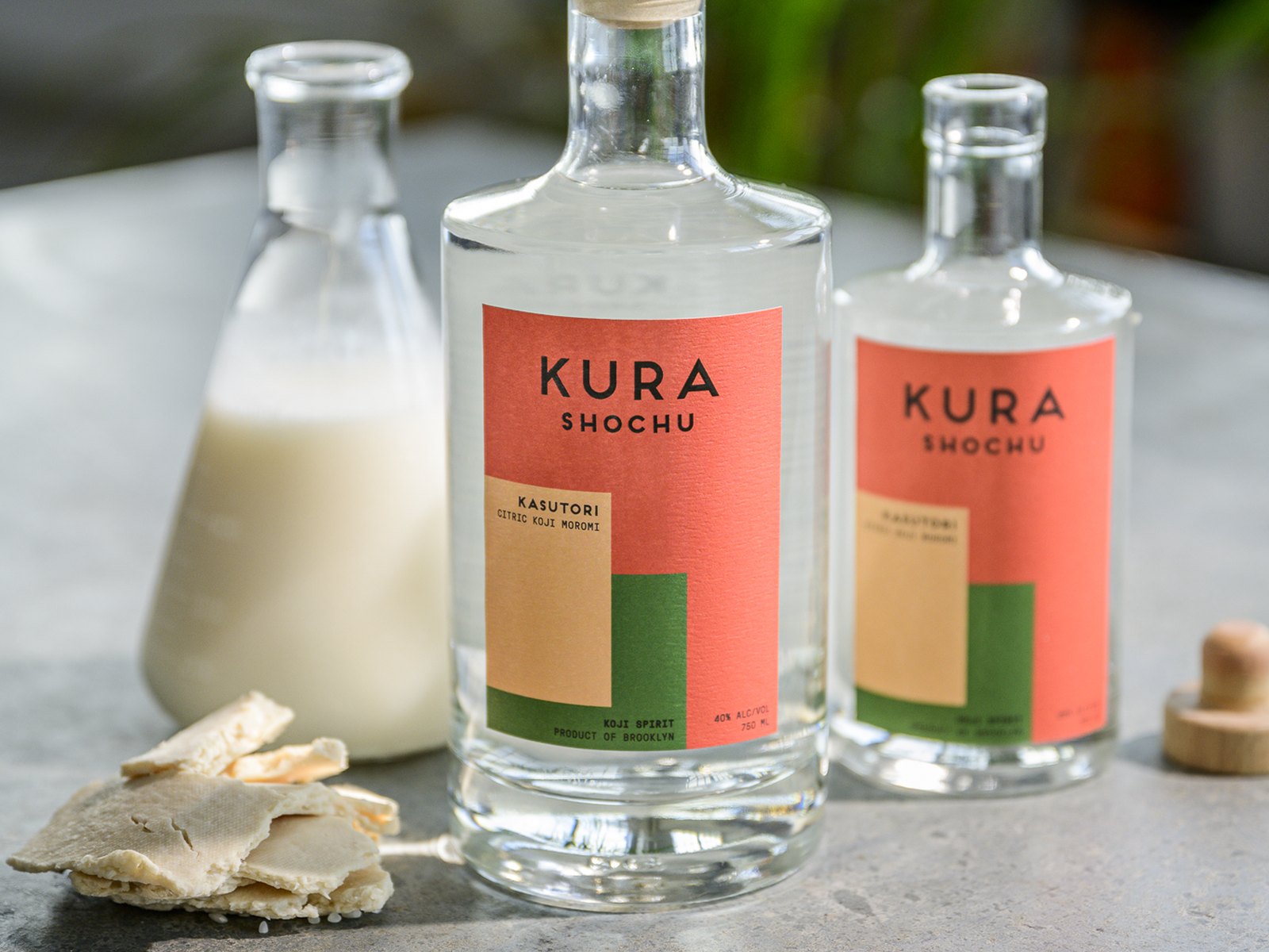Bottles of Brooklyn Kura's house-made Kura Shochu with koji rice and moromi